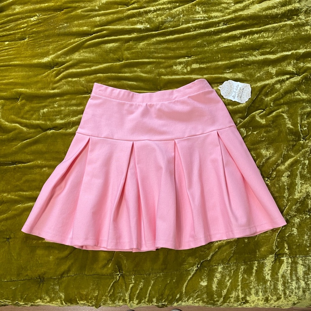 Bright baby pink pleated tennis skirt